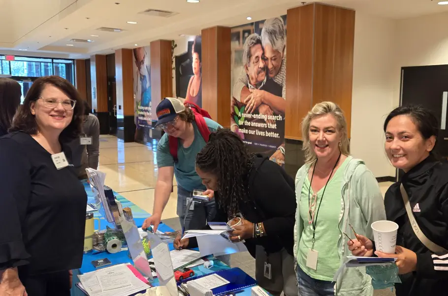 Health partners at a commuter fair table